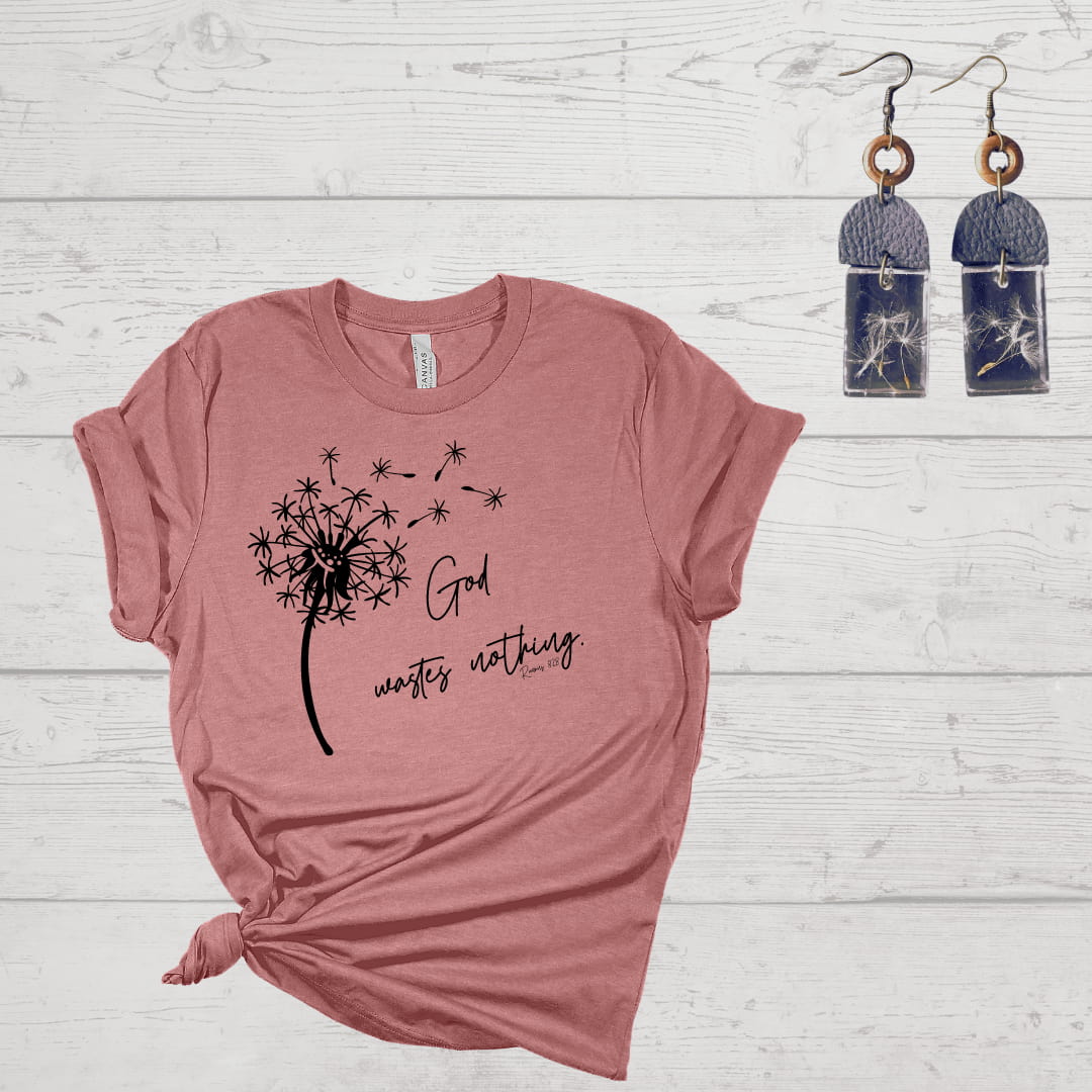 God wastes nothing flat lay with earrings