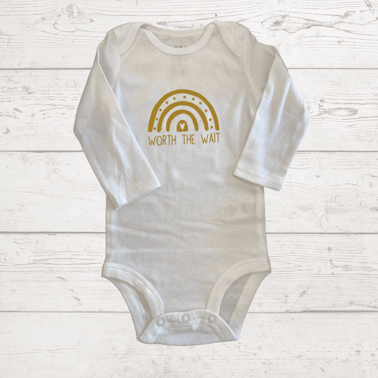white 6-9 onesie